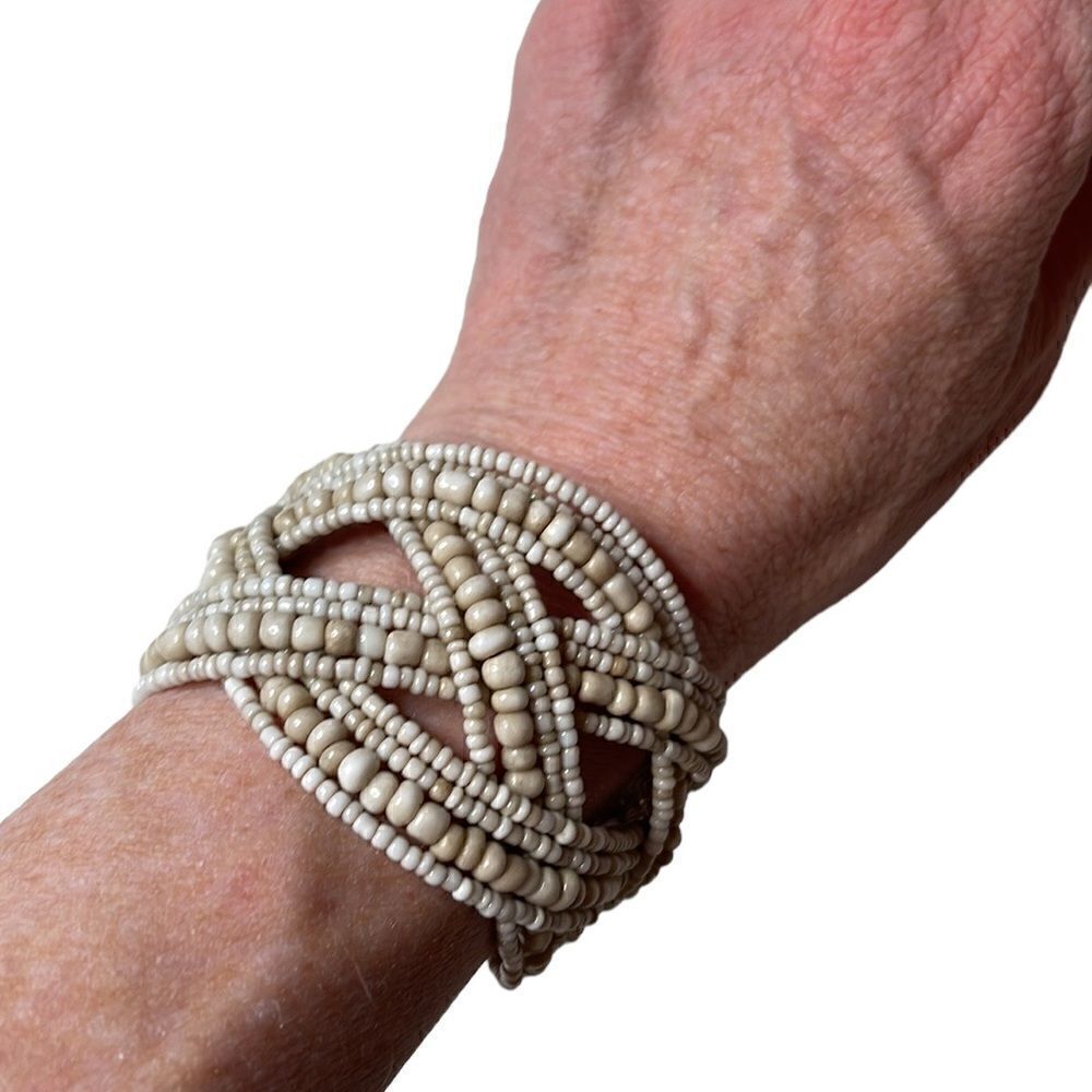 Clam Shell Beaded Braided Bracelet With All Natural Stones.